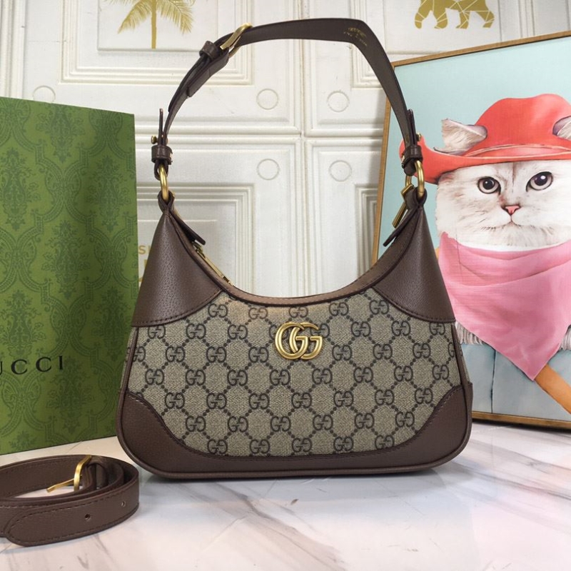 G*u*i top handle bags
